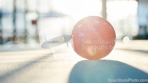 Image of Gymnastics, sports and ball on floor in gym background for training and exercise on studio ground. Creative performance, fitness and closeup of equipment for competition, workout and dance class