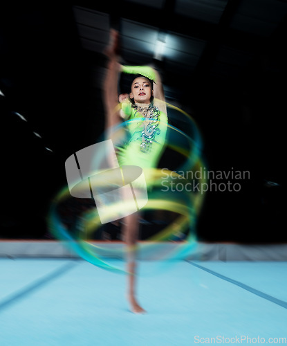 Image of Gymnastics, sports and woman with ribbon dance for rhythmic movement, training and exercise in gym. Creative performance, aerobics and portrait of female dancer for competition, workout and dancing