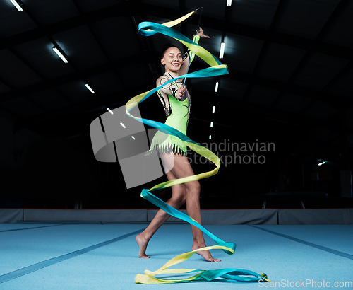 Image of Girl, portrait and gymnast with ribbon for practice during competition with creative exercise. Dancer, happy and gymnastics string for sports with woman for training with energy for healthy body.