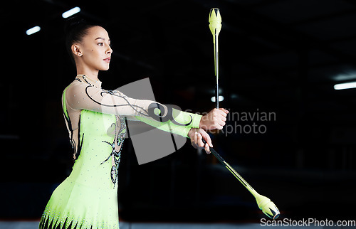 Image of Sports, gymnastics and woman with clubs for performance, rhythmic body movement and training. Aerobics exercise, health and female dancer with equipment for competition, workout and dance practice