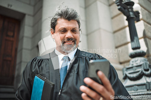 Image of Senior lawyer man, phone and street with smile, thinking and communication on internet app in metro. Happy mature judge, smartphone and reading with ideas on web chat, social media or contact in city