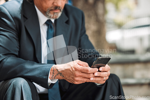 Image of Phone, hands and business man in city for networking, communication and social media. Technology, internet and contact with closeup of employee and mobile app for website, digital and notification