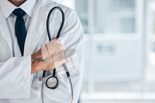 Image of Doctor, stethoscope and health, confidence and hand, cardiology with mockup space and medical professional at hospital. Cardiovascular healthcare, surgeon and medicine, expert and physician at clinic