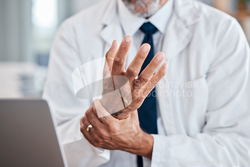 Image of Laptop, wrist pain and hands of business man in office for injury, stress and arthritis. Burnout, emergency and inflammation with closeup of employee for carpal tunnel, accident and medical risk