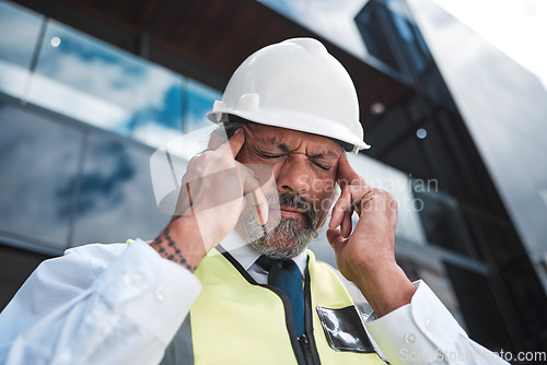 Image of Headache problem, city architect and man depressed over development project, property mistake or anxiety. Urban face, architecture and senior person with migraine, civil engineering fail or stress