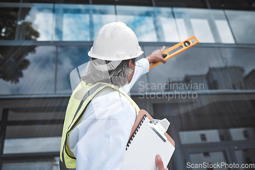 Image of Engineering, checklist and man with tools at construction site inspection, urban development or city project management. Manager or person from behind for outdoor architecture and clipboard survey