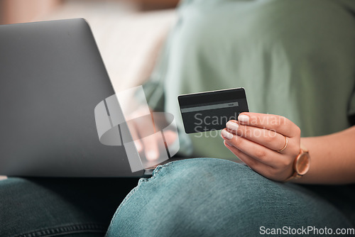 Image of Hand, laptop and credit card for online shopping with a customer on the internet from home. Computer, ecommerce and payment with a person using a bank app for finance, accounting or budget planning