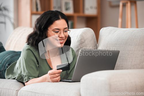 Image of Credit card, laptop and woman for home online shopping, e learning and fintech payment on sofa. Relax, student loan and person on internet banking, study subscription or website transaction on couch