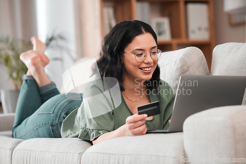 Image of Credit card, computer and woman for home online shopping, e learning and fintech payment on sofa. Relax, student loan and person on laptop banking, study subscription or website transaction on couch