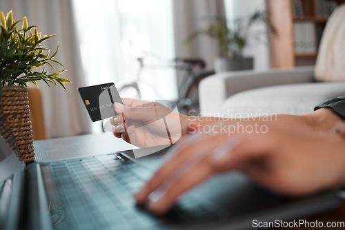 Image of Hand, laptop and credit card for payment with a customer on the internet from home. Computer, ecommerce and online shopping with a person using a bank app for finance, accounting or budget planning