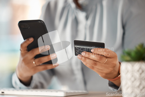 Image of Woman, credit card and hands with phone in office for finance, business accounting and banking password. Closeup of worker, mobile money and internet payment for online shopping, fintech and trading