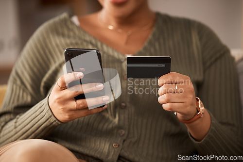 Image of Hands, woman and credit card with phone for online shopping, digital payment and fintech account at home. Closeup of person, mobile banking and finance money for web sales, password and ecommerce app