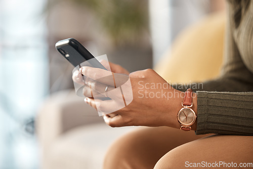 Image of Woman, hands and typing on smartphone in home, reading social media notification or online contact. Closeup of female person with cellphone to download mobile games, search digital network or website