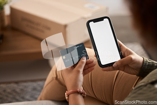 Image of Hands of woman, credit card and mockup phone screen for online shopping, digital payment and fintech account at home. Closeup, banking app and mobile space for money, web sales and financial password