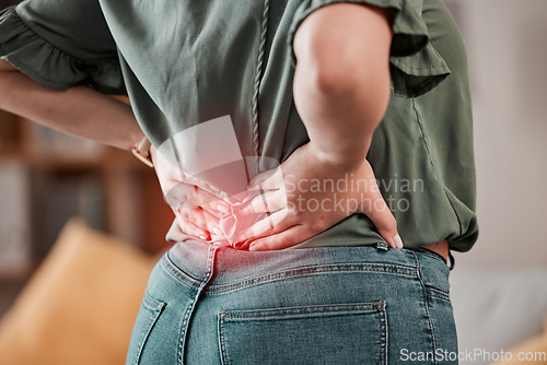 Image of Red, back and pain of woman with injury problem, health risk or muscle inflammation at home. Closeup of uncomfortable female person with glow on spine of bad posture, backache and stress of body