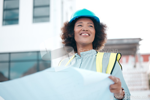 Image of Smile, architect and woman with blueprint in city for construction, building design or development. Happy, engineer and African developer with document, illustration or paperwork for project planning