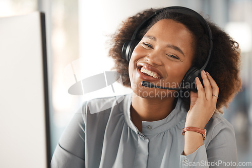 Image of Woman, portrait and call center with smile in office, headphones and microphone for young crm. African girl, customer care expert and listening for technical support, help desk and telemarketing job