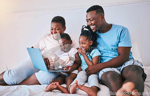 Image of Laptop, black family and relax in a bed with movies, games and streaming in their home. Online, film and children with parents in bedroom for weekend fun, subscription or cartoon, care and smile