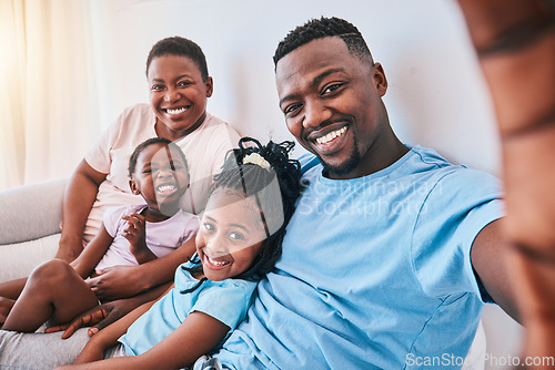 Image of Selfie, black family and bond in a bed with smile, care and love together in their home. Portrait, memory and children with parents in bedroom hug and relax for a happy profile picture in a house