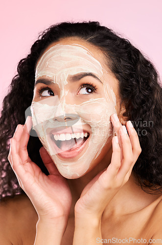 Image of Skincare, facial and face of woman with mask for wellness, spa treatment and cosmetics in studio. Dermatology, salon aesthetic and female person for detox, hygiene and cleaning on pink background