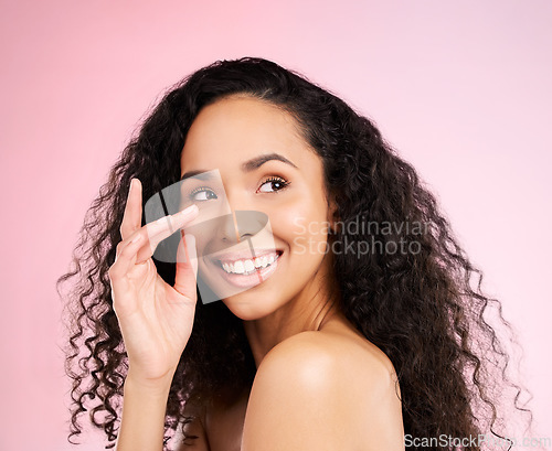 Image of Skincare, smile and glow with black girl on body in studio or isolated and pink background for spa treatment. Beauty, natural face and female person with curly haircare for self love with facial.