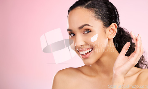 Image of Skincare mockup, cream and portrait of woman in studio for wellness, spa treatment and cleaning. Dermatology, beauty and face of happy female person with cosmetics, moisturizer and anti aging lotion