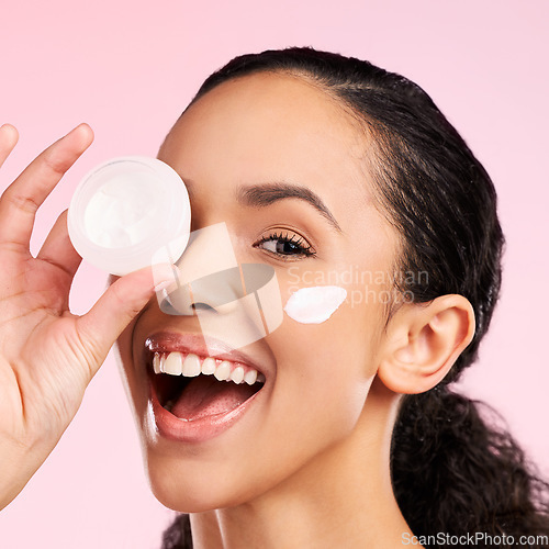 Image of Skincare, cream jar and portrait of woman in studio for wellness, facial treatment and cosmetics. Dermatology, spa and face of happy female person with anti aging product, moisturizer and lotion