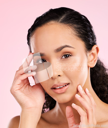 Image of Beauty, cosmetics and portrait of woman in studio for wellness, facial treatment and skincare. Dermatology, spa aesthetic and female person with healthy skin, glow and natural face on pink background