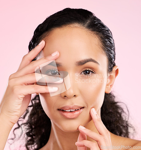 Image of Skincare, beauty and portrait of woman with hands in studio for wellness, facial treatment and cosmetics. Dermatology, spa and female person with luxury, glow and natural face on pink background