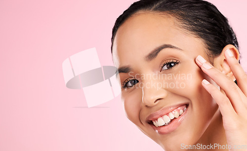 Image of Skincare mockup, beauty and portrait of woman in studio for wellness, facial treatment and cosmetics. Dermatology, spa and female person touching face for health, glow and shine on pink background