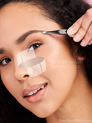 Image of Face, closeup and woman with tweezer for eyebrow, beauty and grooming for skincare. Natural portrait, facial plucking and hair removal of model for self care, wellness or aesthetic for cosmetics.
