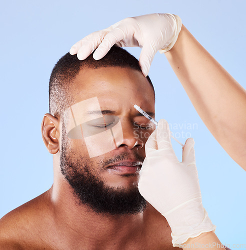 Image of Black man, plastic surgery and syringe in studio for beauty, anti-aging or facial transformation by background. African patient, model and medic hands for dermatology, needle or fillers for aesthetic