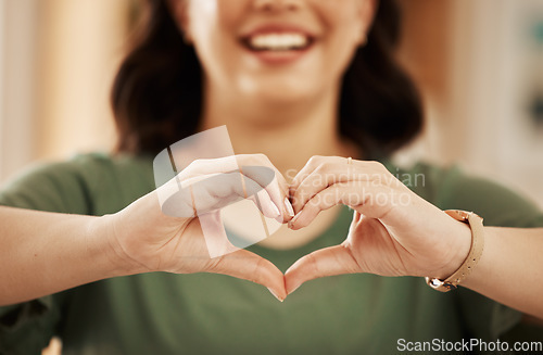 Image of Happy, heart and love with hands of woman for support, kindness and motivation. Health symbol, peace and thank you with closeup of person and emoji sign at home for vote, hope and like icon