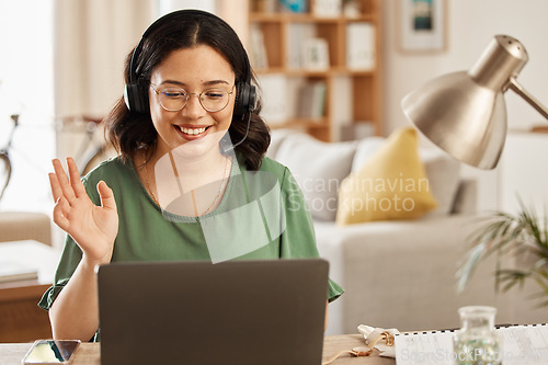 Image of Home customer service, laptop video call and woman smile, wave hello and greeting on freelance web conference. Telemarketing, remote work connection and happy person consulting on tech support advice