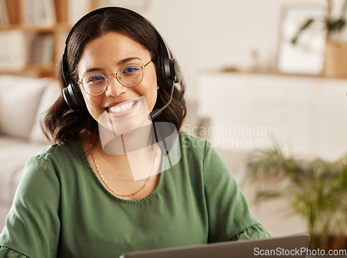 Image of Remote work, portrait and woman for online meeting at home with laptop and online job. Headphones, female person and computer in a house with a smile from digital web blogger at desk in living room