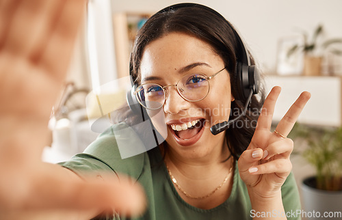 Image of Woman, call center and selfie with smile, peace sign and post with work from home office, headphones and mic. Influencer girl, telemarketing agent or crm for memory, social media or profile picture