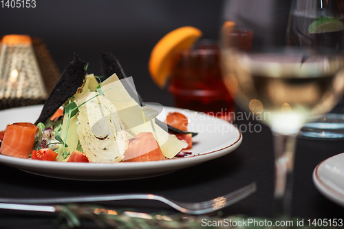 Image of Caesar salad with salmon fish