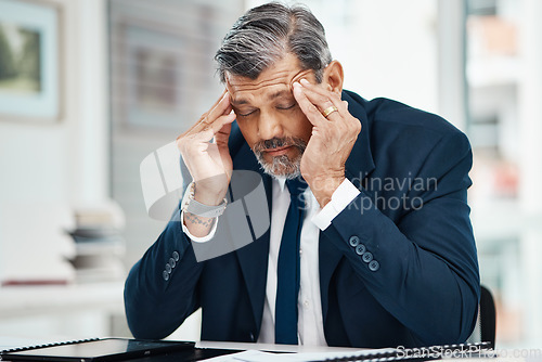 Image of Headache, pain and business man in office for financial report, mistake or problem and career crisis with documents. Stress, tired or fatigue executive, CEO or corporate person in accounting or taxes