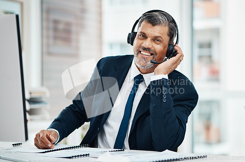 Image of Portrait, call center and mature man with smile for business, customer service and listening for support. Face, telemarketing and happy professional, sales agent and entrepreneur working at help desk