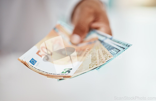 Image of Person, hands and money fan of bills, finance and banking for exchange, budget and financial freedom. Closeup of rich investor, profit and income of bonus, cash savings and wealth of accounting notes