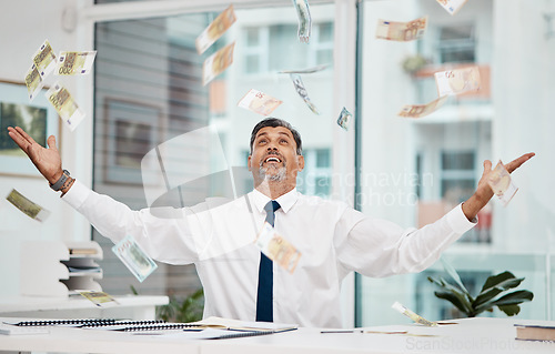 Image of Happy senior businessman, money rain and celebration for financial freedom, lottery or salary at office. Excited mature man with smile for winning cash, lottery or growth on investment and savings