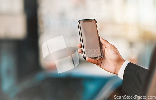 Image of Closeup, business and man with a smartphone, city and connection with social media, travel and mockup. Location, person or professional with a cellphone, mobile application and outdoor with network