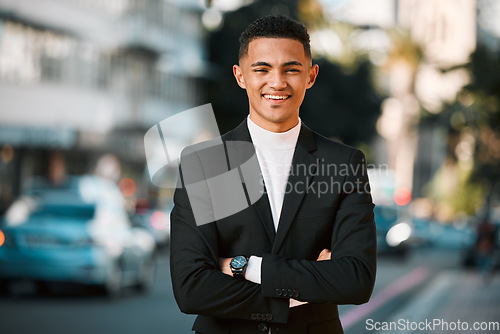 Image of Crossed arms, business and portrait of happy man in city for confident, startup goals and commute. Travel, professional job and face of male entrepreneur in urban town for career, working and success
