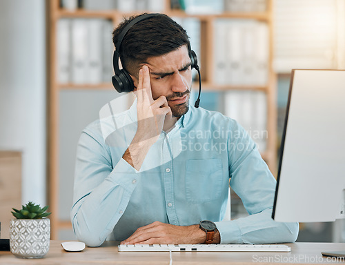 Image of Stress, call center or man angry at computer, telemarketing agency and fail with headache, frustrated error or 404 glitch. Confused salesman at pc with challenge, client account problem or CRM crisis