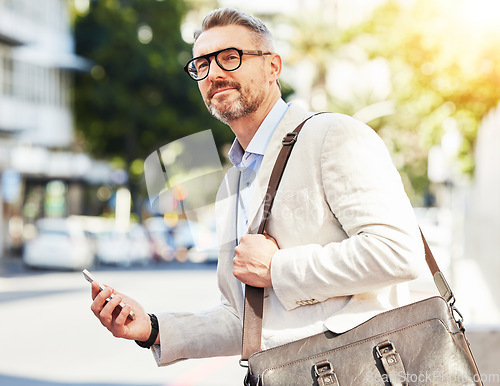 Image of Business, travel and man with phone in a city street for location, search or guide outdoor. Smartphone, trip and male manager online for traveling app, directions or navigation on morning commute