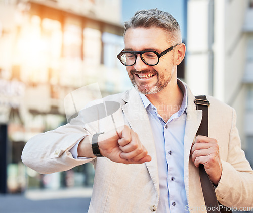 Image of City, mature businessman and checking time for travel, morning commute or appointment. Professional, corporate and an employee or manager with a watch to be early or late for work with a smile