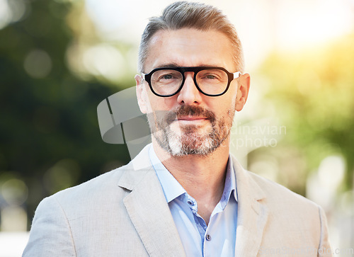 Image of Serious, portrait and business man in city for professional, executive or corporate. Ceo, manager and mission with face of mature male employee in new york for pride, confidence or entrepreneur