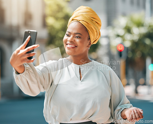 Image of City, business and black woman with a smile, selfie and confident with happiness, memory and profile picture. Female person, professional or happy entrepreneur with joy, outdoor and social media post