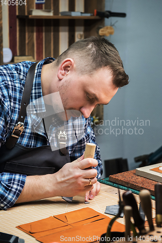 Image of Concept of handmade craft production of leather goods.