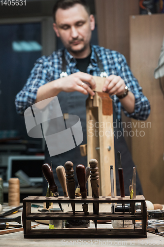 Image of Concept of handmade craft production of leather goods.